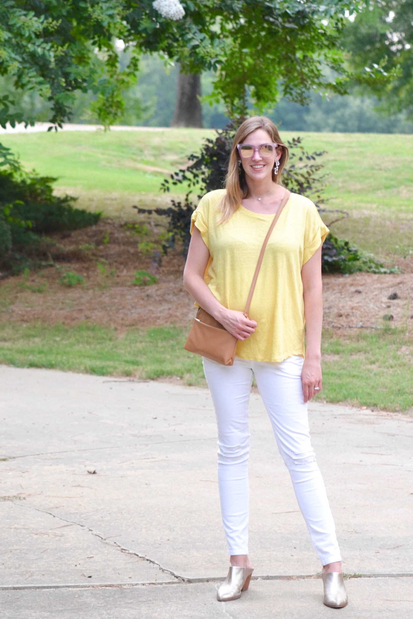 Canary Yellow from Hatch Collection and ripped white skinny jeans from Posh Bump // second trimester style // www.thehiveblog.com